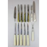 A set of four George V silver blade knives with green stained ivory handles, Sheffield 1916, a