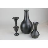 A bronze bottle neck vase, an Indian bronze vase with engraved decoration and an Indian bronze