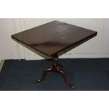 A mahogany tilt-top table, with rectangular top, on spiral turned tripod base, 77cm by 74cm