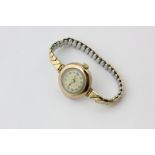 A 9ct rose gold wrist watch on replaced gilt bracelet London import mark for 1919