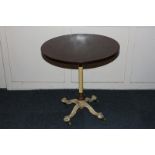 A Victorian circular mahogany occasional table, on painted cast iron stem and four legs with paw