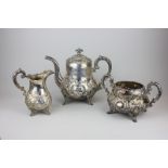 A matched Victorian style  three piece tea set, the milk jug and sugar bowl by William Hunter,