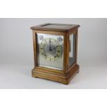 An early 20th century Winter-Halder and Hofmier mantle clock the silverised dial with Roman numerals