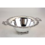 A 20th century Italian silver oval dish, maker Mario Buccellati, with highly decorated border and