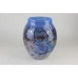 A Monart glass vase in blues and purples with partial paper label to base 23cm high