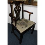 A George III mahogany carver dining chair, with pierced ribbon splat, floral carved top rail, scroll