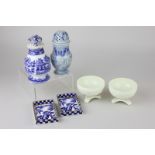 Two 19th century blue and white porcelain peppers, two creamware salts with embossed floral swag