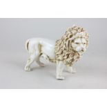 A late 19th century Rudolstad & Volkstedt porcelain figure of a lion with hand painted accents