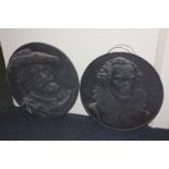 A cast iron circular portrait wall plaque of William Shakespeare 55cm and another of Peter Paul