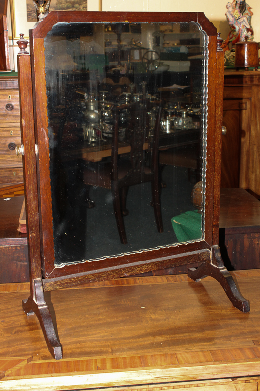 An adjustable dressing table mirror, on splayed supports, 47cm