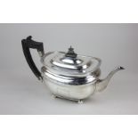 A Victorian silver teapot with gadroon border, chased floral detail and vacant cartouche, maker