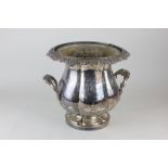A silver plated two-handled planter with flared rim and scroll decoration, height 23cm