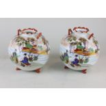 A pair of Japanese porcelain globular vases depicting Geishas by a lakeside with scalloped rim,