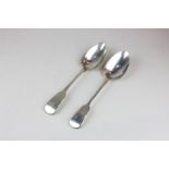 A George III Scottish silver fiddle pattern serving spoon, maker WW, Edinburgh, 1812 together with a