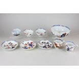 A Chinese porcelain slop bowl, two Chinese porcelain tea bowls and saucers, a teacup and saucer,