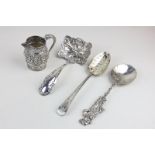 A Dutch silver sifter spoon, 1923, together with a Dutch silver spoon with, London 1902; import
