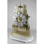 A 19th century double fusee brass skeleton clock in York Minster design, attributed to Evans of