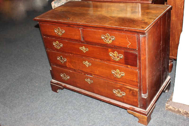 A 19th century mahogany chest, of two short over three long drawers, on bracket feet, 94cm