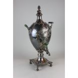 An 18th century Sheffield silver plated samovar with embossed floral and scroll cartouche,