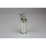 A silver plated travelling scent bottle with pump action  8cm high