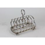 A Walker & Hall silver plated six division toast rack
