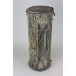 An African double ended drum with leather skins 44cm