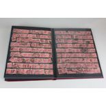 A full stamp album of British penny and half penny stamps all from 1905 together with an envelope of