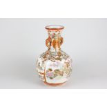 A Japanese porcelain baluster shape vase with rust and gilt decoration around lakeside scenes,