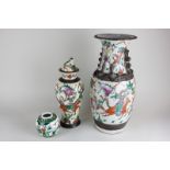 A Japanese pottery vase with overlaid detail (a/f), a crackle glaze jar and cover depicting warriors