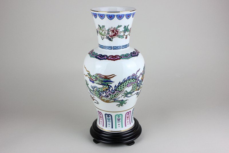 A Chinese porcelain vase, The Dance of the Celestial Dragon, marked FM1985 depicting dragon