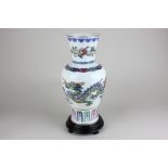 A Chinese porcelain vase, The Dance of the Celestial Dragon, marked FM1985 depicting dragon