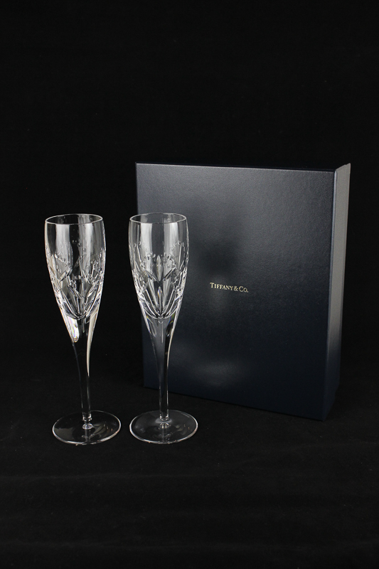 A boxed set of two Tiffany & Co cut glass champagne flutes