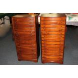 A pair of mahogany collector's cabinet of fourteen drawers, on bracket feet, 43cm