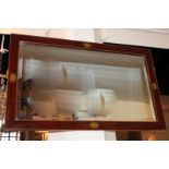 An inlaid mahogany rectangular wall mirror with bevelled glass, 65cm