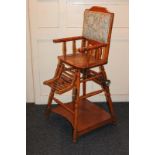 A pine folding high chair, converting into a table and chair