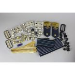 A selection of RAF rank braids with RAF Group Captain epaulets and a selection of RAF uniform