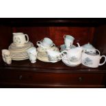 A Susie Cooper Gardenia pattern part tea set, together with a part dinner service of the same