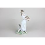 A Lladro porcelain figure, Gardens of Athens (ref 7704), Lladro Privilege Society 2004, 24cm high,