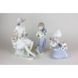 A Lladro porcelain Collectors' Society porcelain figure 1989, a Lladro figure of a girl with a cat