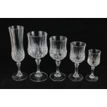 A set of cut glass drinking glasses comprising six champagne, red wine, white wine, water and
