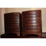 A pair of mahogany collector's seven drawer cabinets on bracket feet, 26cm wide