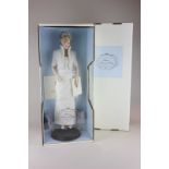 The Franklin Mint, Diana Princess of Wales, porcelain portrait doll in original box with accessories