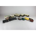 A 00 gauge American style locomotive and tender, TR 2335, together with three Pullman carriages, a