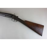 A 19th century pin fire double barrel shotgun marked George Newnham, with oak stock, 117cm total