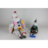 Two china clown dolls with cloth bodies and china limbs, longest 54cm