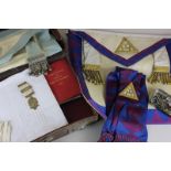 Masonic interest, a silver gilt Masonic medal together with apron, gloves and sash, with assorted