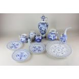 An assortment of European blue and white china including two jugs, a pot pourri jar and cover, three