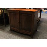 A mahogany collector's cabinet of seven drawers enclosed by two panel doors, on bracket feet, 53cm