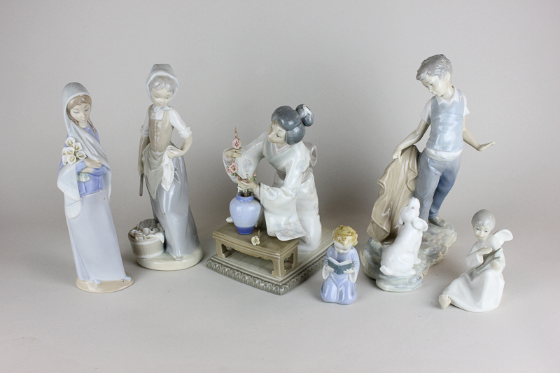 A Lladro porcelain figure of a Japanese woman arranging flowers, in original box, another of a