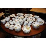 A large collection of Royal Worcester Evesham pattern table ware including serving dishes and tea